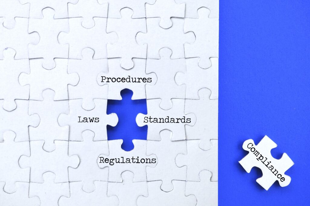 Compliance concept - changing procedures to adhere to regulations laws standards - puzzle pieces